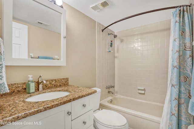 3150 N Harbor City Blvd Unit 236, Melbourne, FL 32935 - bathroom featuring vanity, shower / tub combo, visible vents, and toilet