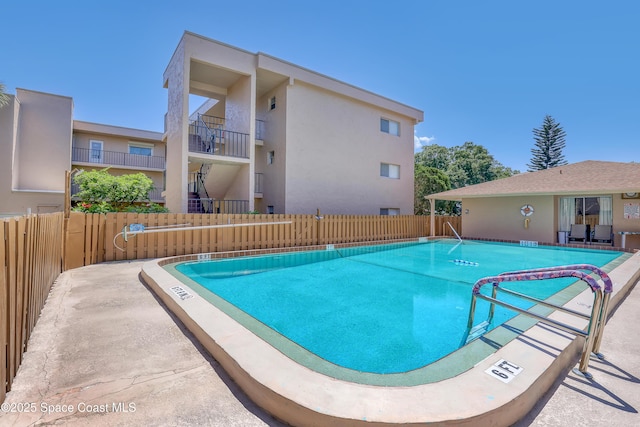 3150 N Harbor City Blvd Unit 236, Melbourne, FL 32935 - pool featuring a patio area and fence