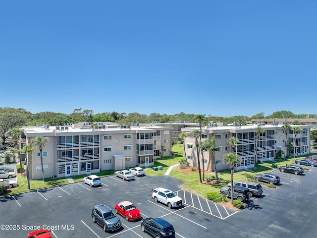 3150 N Harbor City Blvd Unit 236, Melbourne, FL 32935 - view of property with uncovered parking