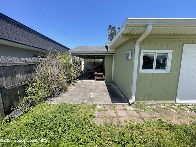 exterior space featuring a patio and fence