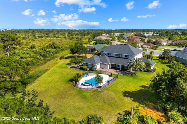 aerial view of residential area with a pool area
