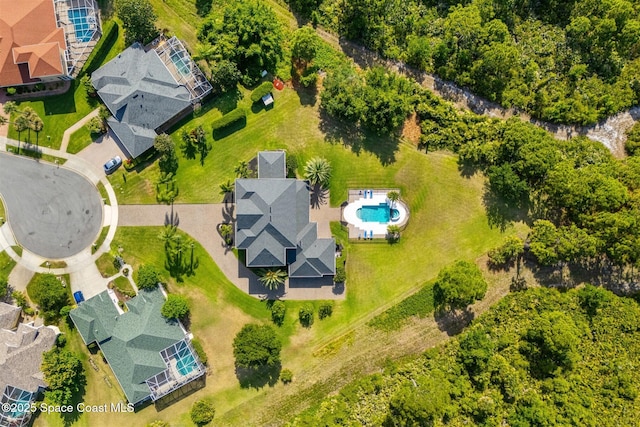 drone / aerial view of a pool area