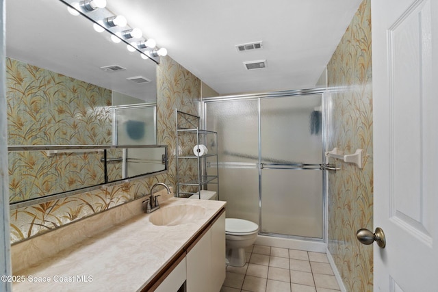 5801 N Banana River Blvd Unit 936, Cape Canaveral, FL 32920 - full bathroom featuring a shower stall, tile patterned floors, toilet, visible vents, and wallpapered walls