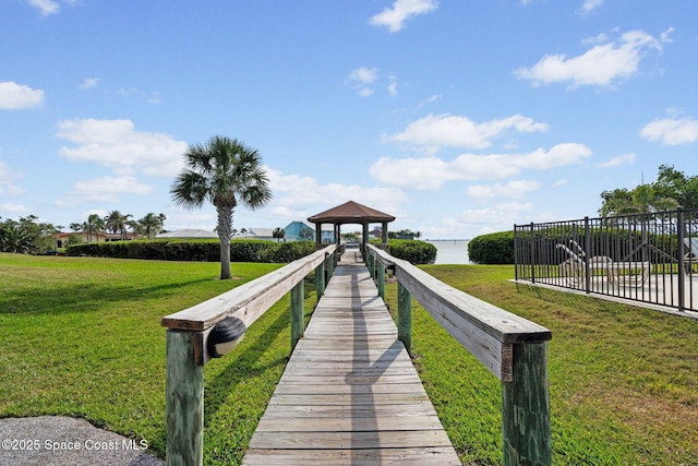 5801 N Banana River Blvd Unit 936, Cape Canaveral, FL 32920 - view of property's community featuring fence, a gazebo, a yard, and a water view