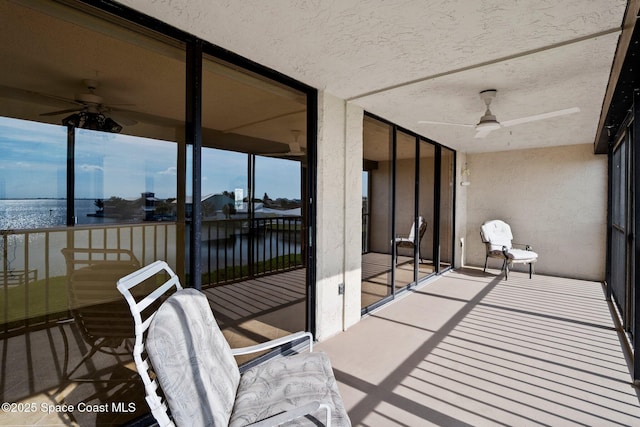 5801 N Banana River Blvd Unit 936, Cape Canaveral, FL 32920 - balcony featuring a ceiling fan and a water view