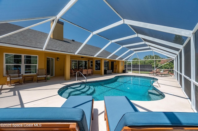 view of swimming pool with a patio, a fenced in pool, and a ceiling fan