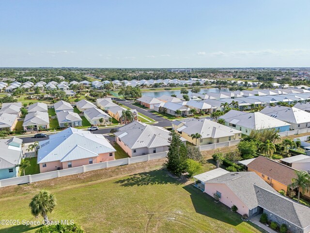 4040 Alamanda Key Dr, Melbourne, FL 32901 - aerial perspective of suburban area featuring a nearby body of water