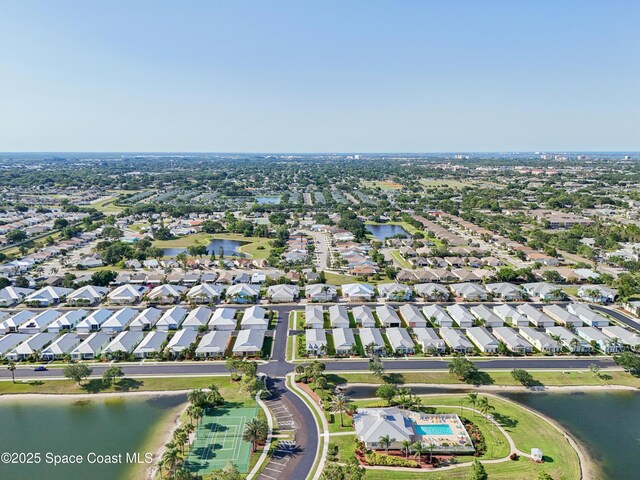 4040 Alamanda Key Dr, Melbourne, FL 32901 - aerial view of property and surrounding area with a large body of water and nearby suburban area
