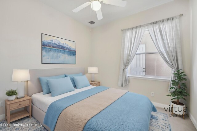 4040 Alamanda Key Dr, Melbourne, FL 32901 - carpeted bedroom with baseboards and ceiling fan