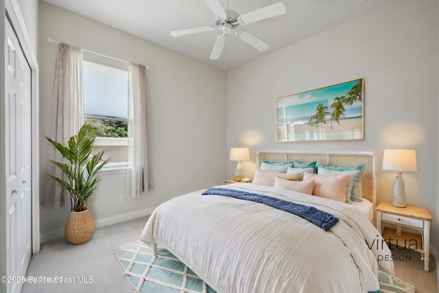 4040 Alamanda Key Dr, Melbourne, FL 32901 - bedroom with carpet floors, baseboards, a closet, and ceiling fan