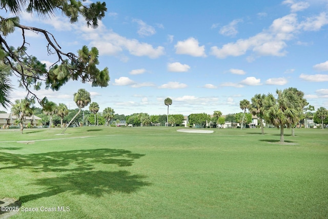 2245 Golf Isle Dr Unit 424, Melbourne, FL 32935 - view of property's community featuring view of golf course and a lawn