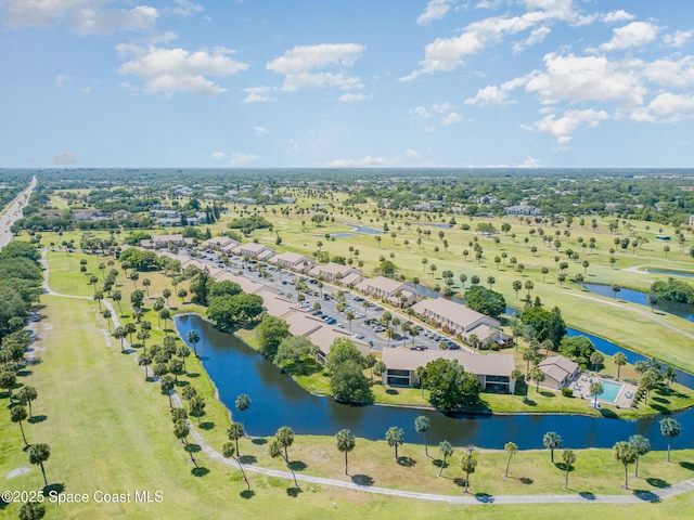 2245 Golf Isle Dr Unit 424, Melbourne, FL 32935 - drone / aerial view featuring a water view