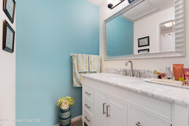 2245 Golf Isle Dr Unit 424, Melbourne, FL 32935 - bathroom featuring vanity and a textured ceiling