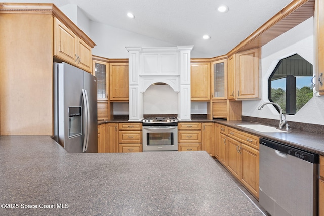 4000 Ocala St, Cocoa, FL 32926 - kitchen featuring glass insert cabinets, dark countertops, stainless steel appliances, and a sink