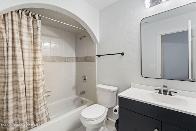 4000 Ocala St, Cocoa, FL 32926 - full bath featuring toilet, a textured wall, vanity, and shower / tub combo with curtain