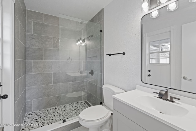 4000 Ocala St, Cocoa, FL 32926 - bathroom featuring toilet, vanity, and a tile shower