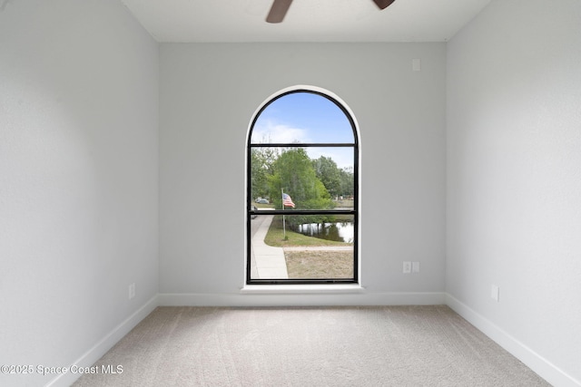 4000 Ocala St, Cocoa, FL 32926 - carpeted spare room with ceiling fan and baseboards