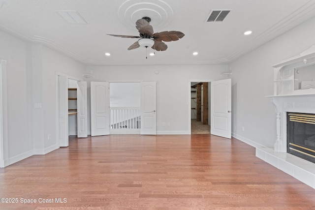 4000 Ocala St, Cocoa, FL 32926 - unfurnished living room featuring light wood-type flooring, a ceiling fan, visible vents, and recessed lighting