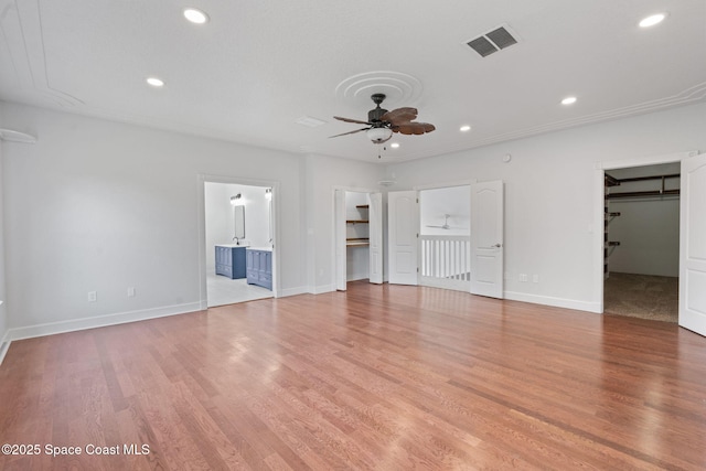 4000 Ocala St, Cocoa, FL 32926 - unfurnished bedroom featuring visible vents, recessed lighting, and a walk in closet