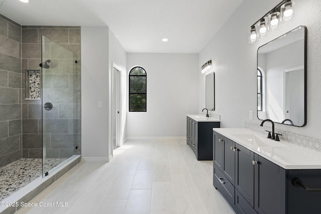 4000 Ocala St, Cocoa, FL 32926 - full bathroom with recessed lighting, two vanities, a sink, and a stall shower