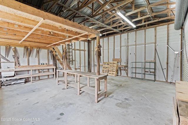 4000 Ocala St, Cocoa, FL 32926 - miscellaneous room featuring a garage and unfinished concrete floors