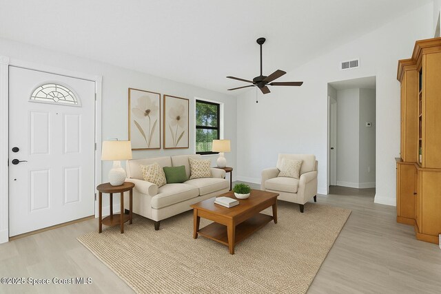 4000 Ocala St, Cocoa, FL 32926 - living area featuring baseboards, light wood-style flooring, visible vents, and a ceiling fan