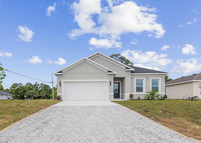 single story home with a front lawn, stucco siding, driveway, and a garage