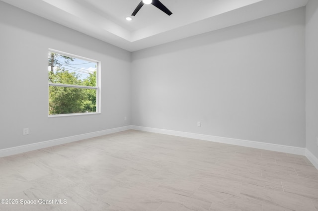 empty room with ceiling fan, baseboards, and recessed lighting