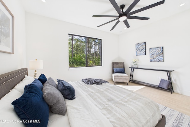 bedroom featuring wood finished floors, recessed lighting, and ceiling fan
