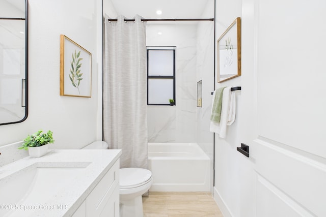 bathroom with toilet, vanity, shower / tub combo with curtain, and recessed lighting