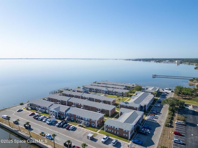 bird's eye view with a water view