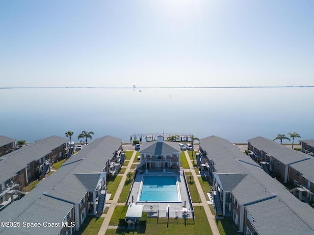 birds eye view of property with a residential view