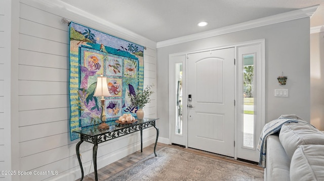 235 Northgrove Dr, Merritt Island, FL 32953 - entrance foyer featuring ornamental molding, wood finished floors, and recessed lighting