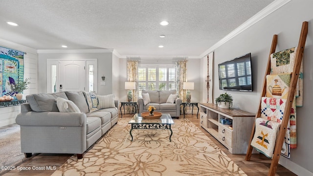 235 Northgrove Dr, Merritt Island, FL 32953 - living room with ornamental molding, a textured ceiling, light wood-style flooring, and recessed lighting