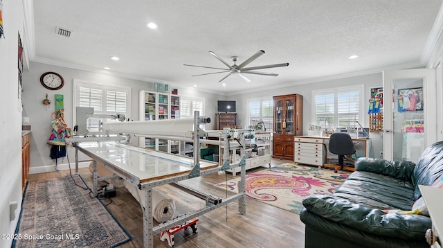 235 Northgrove Dr, Merritt Island, FL 32953 - office featuring ceiling fan, ornamental molding, recessed lighting, light wood-style floors, and baseboards
