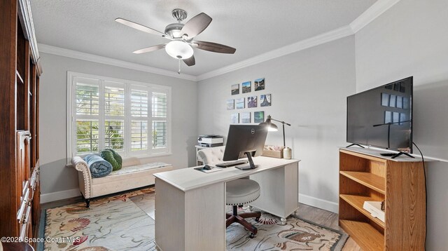 235 Northgrove Dr, Merritt Island, FL 32953 - office with light wood-style floors, ceiling fan, ornamental molding, and baseboards
