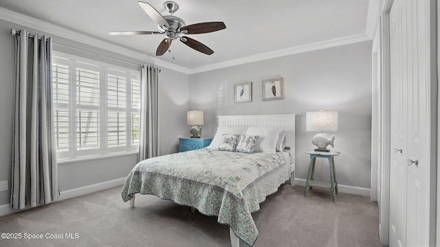 235 Northgrove Dr, Merritt Island, FL 32953 - carpeted bedroom featuring baseboards, crown molding, and ceiling fan
