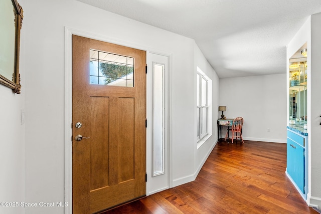 170 Maple Dr, Satellite Beach, FL 32937 - foyer entrance featuring wood-type flooring and baseboards
