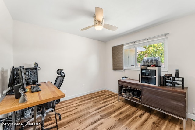 170 Maple Dr, Satellite Beach, FL 32937 - home office with wood finished floors, baseboards, and ceiling fan