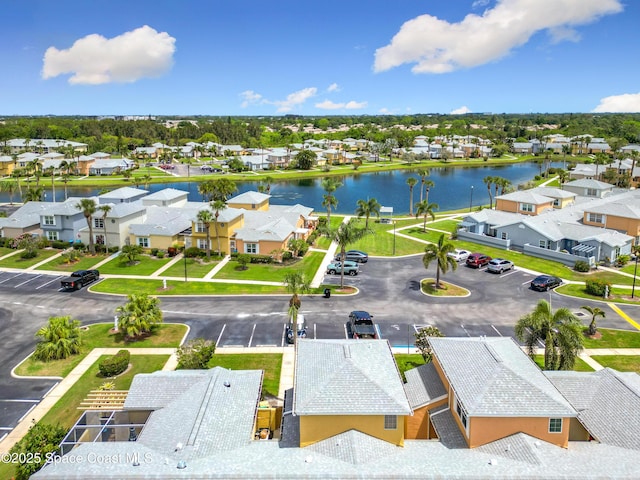 aerial view featuring a water view and a residential view
