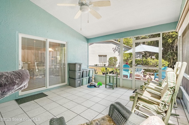 sunroom with a ceiling fan