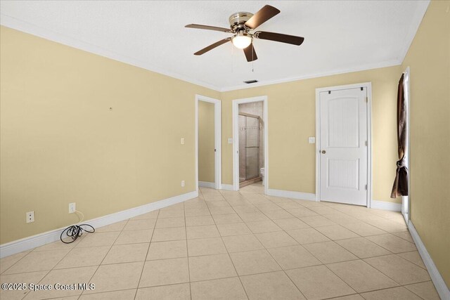 1845 Robalo Dr Unit 201D, Vero Beach, FL 32960 - spare room featuring a ceiling fan, baseboards, ornamental molding, and visible vents