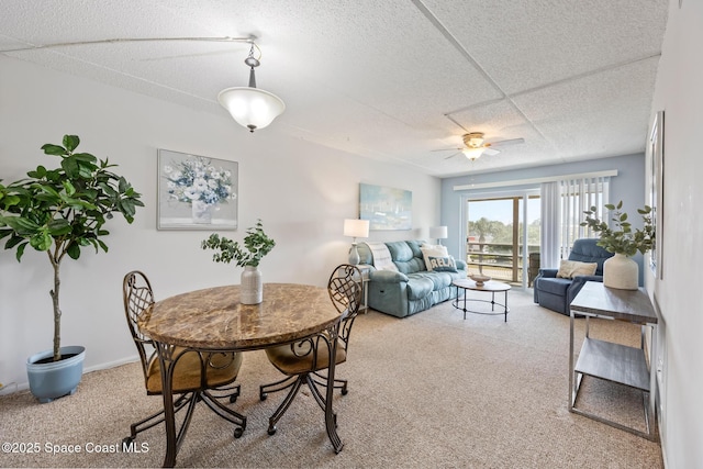 3150 N Harbor City Blvd Unit 341, Melbourne, FL 32935 - carpeted dining room with ceiling fan and a textured ceiling