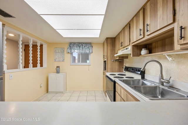 3150 N Harbor City Blvd Unit 341, Melbourne, FL 32935 - kitchen featuring range with electric cooktop, light tile patterned floors, a sink, visible vents, and under cabinet range hood