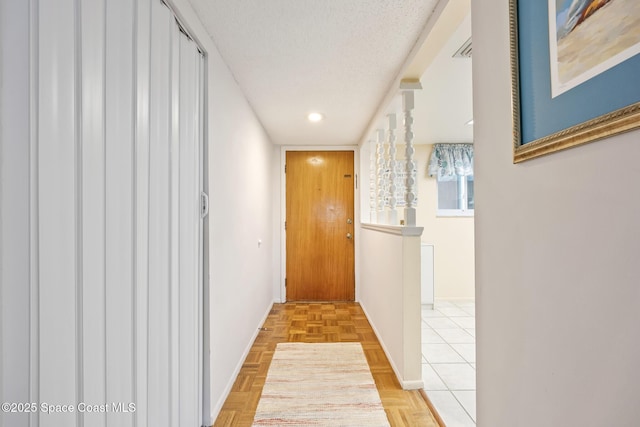 3150 N Harbor City Blvd Unit 341, Melbourne, FL 32935 - corridor with baseboards, recessed lighting, and a textured ceiling