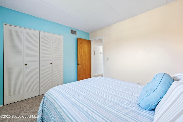 3150 N Harbor City Blvd Unit 341, Melbourne, FL 32935 - bedroom with visible vents, a closet, and carpet
