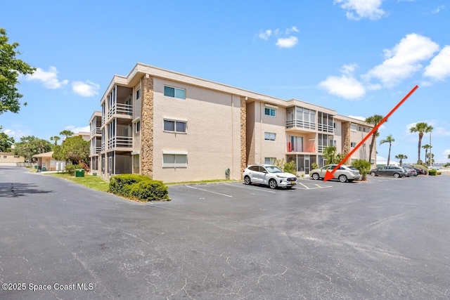 3150 N Harbor City Blvd Unit 341, Melbourne, FL 32935 - view of property with uncovered parking