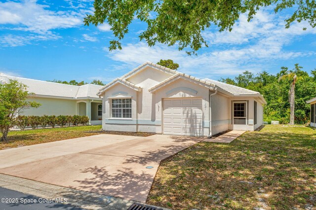 1157 Goldenrod Cir NE, Palm Bay, FL 32905 - single story home with stucco siding, driveway, a tiled roof, and an attached garage