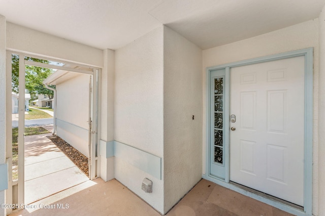 1157 Goldenrod Cir NE, Palm Bay, FL 32905 - entrance to property featuring stucco siding