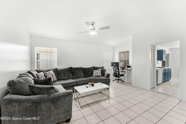 1157 Goldenrod Cir NE, Palm Bay, FL 32905 - living area with light tile patterned floors, a ceiling fan, and vaulted ceiling